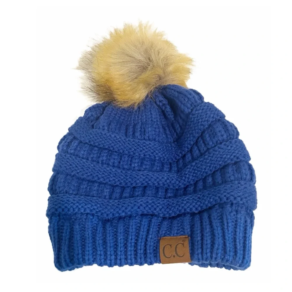 NWOT blue Pompom CC beanie.